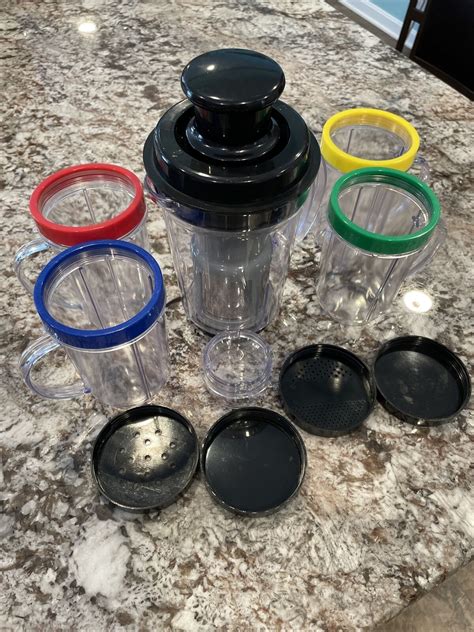 Magic bullet cups with lids